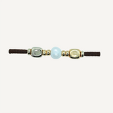 Pulsera con perla y piezas doradas para mujer