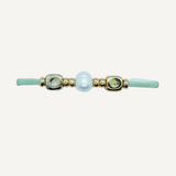 Pulsera para mujer con perla y piezas doradas