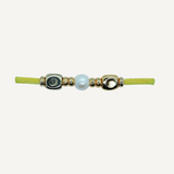 Pulsera con seda elástica miz color mostaza