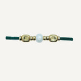 Pulsera con perla y piezas doradas para mujer